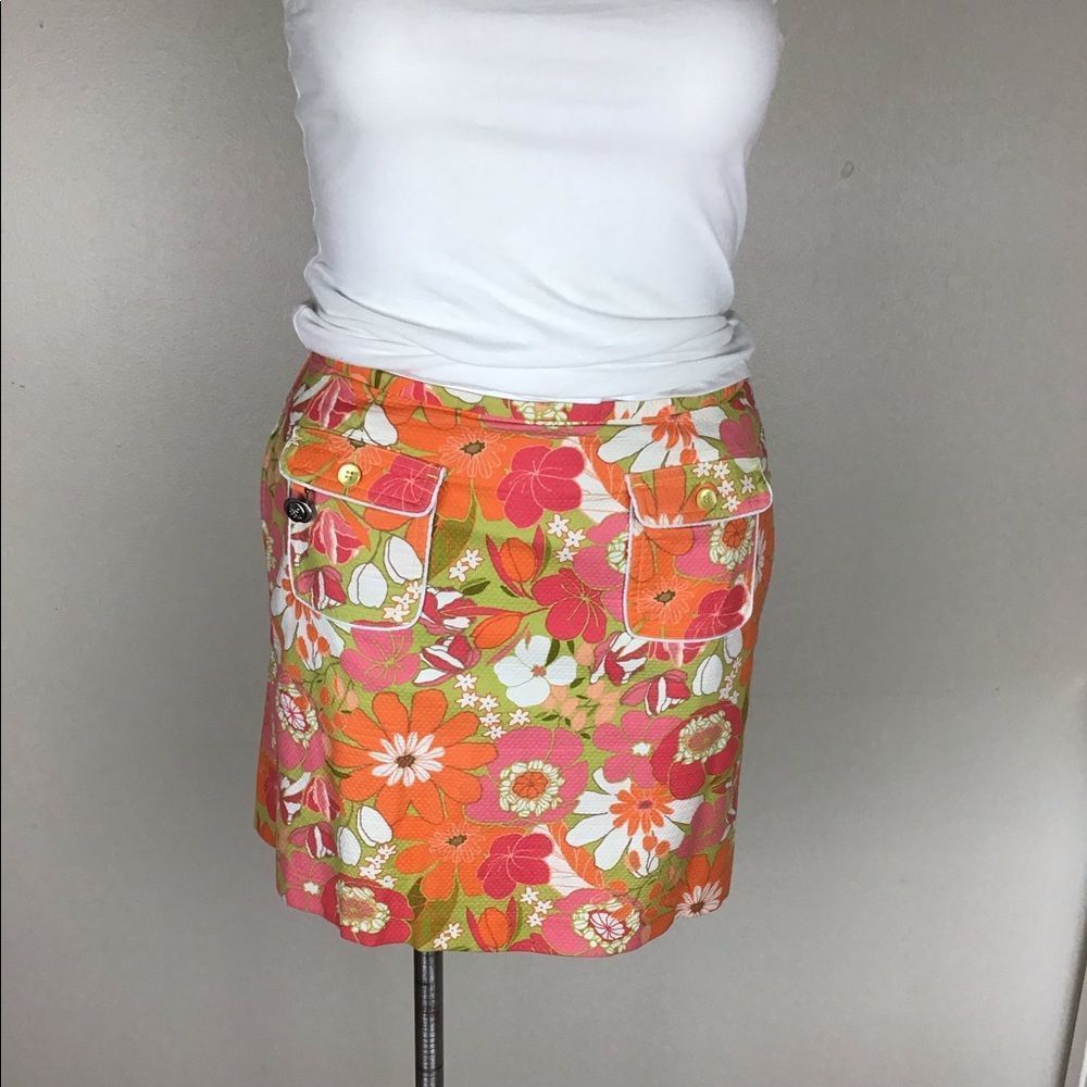Liz golf skirt. Floral colored retro size 12.